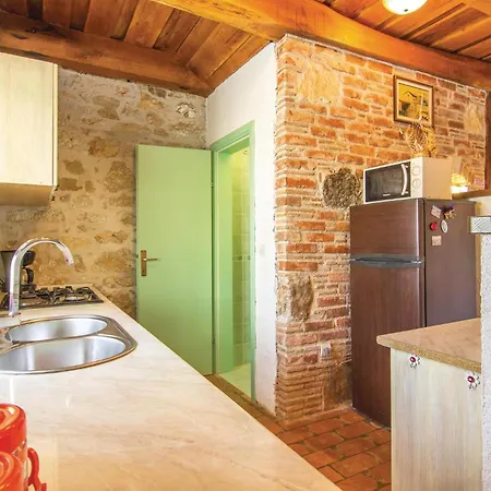 Holiday home Cozy In With Jacuzzi *
